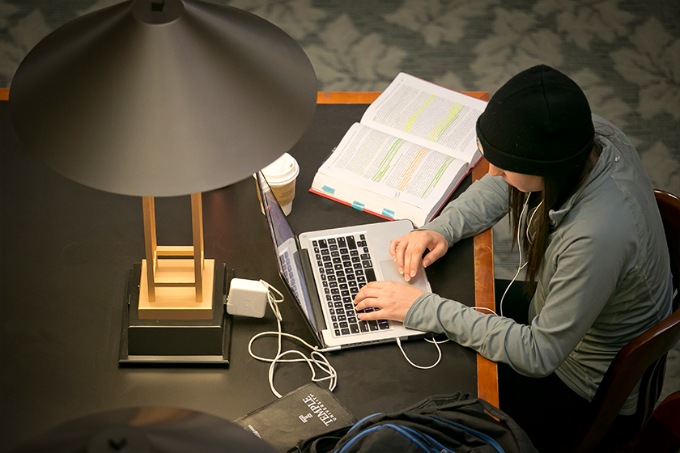 law student working on laptop